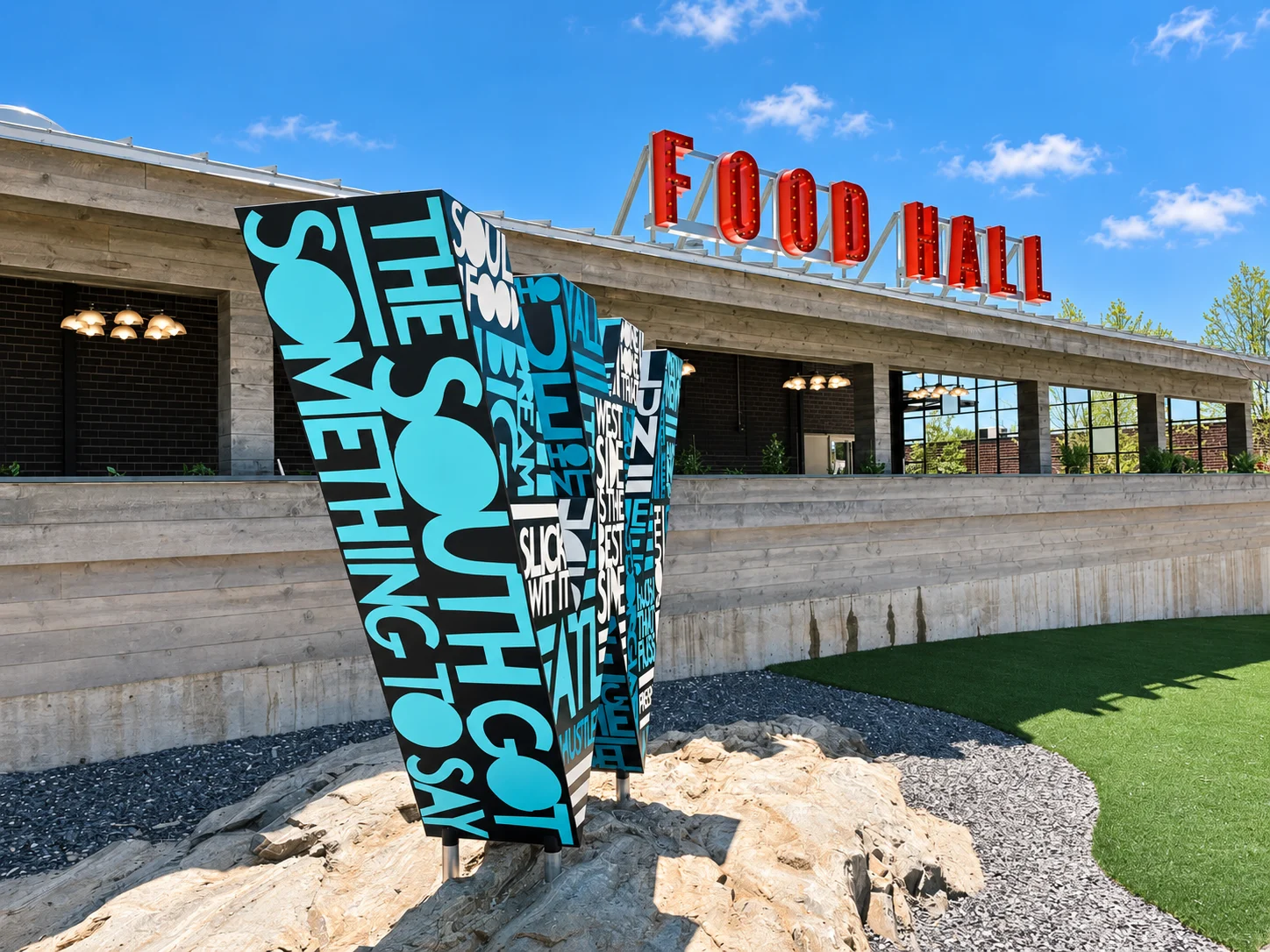 The W sculpture and Food Hall sign outside Chattahoochee Food Works